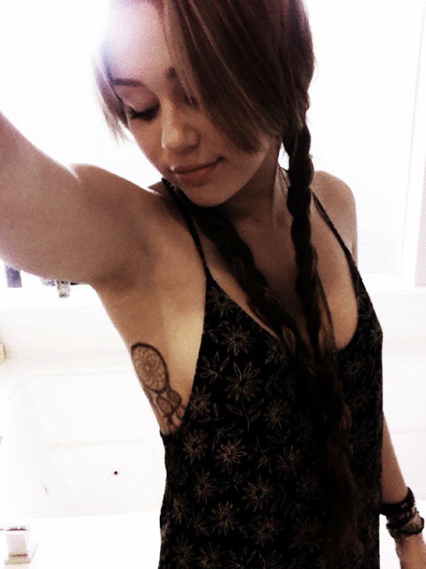 miley cyrus tattoos pictures. Miley Cyrus Tattoos Pictures